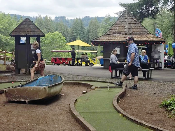 Playing putt putt mini golf at Alderbrook