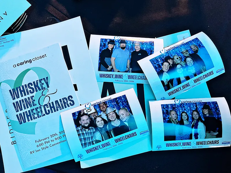 Photobooth photos of Heritage NW Group employees at the Whiskey, Wine, & Wheelchairs event
