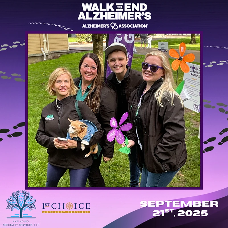 Heritage employees stand holding flowers and a dog. There is a banner around the photo noting the date, Sept 21, 2025 and that this was taken at the Walk to End Alzheimer's.